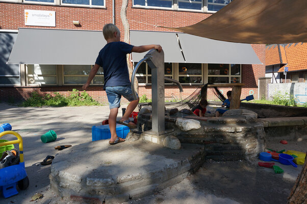 Foto waterspeelplaats bij zandbak